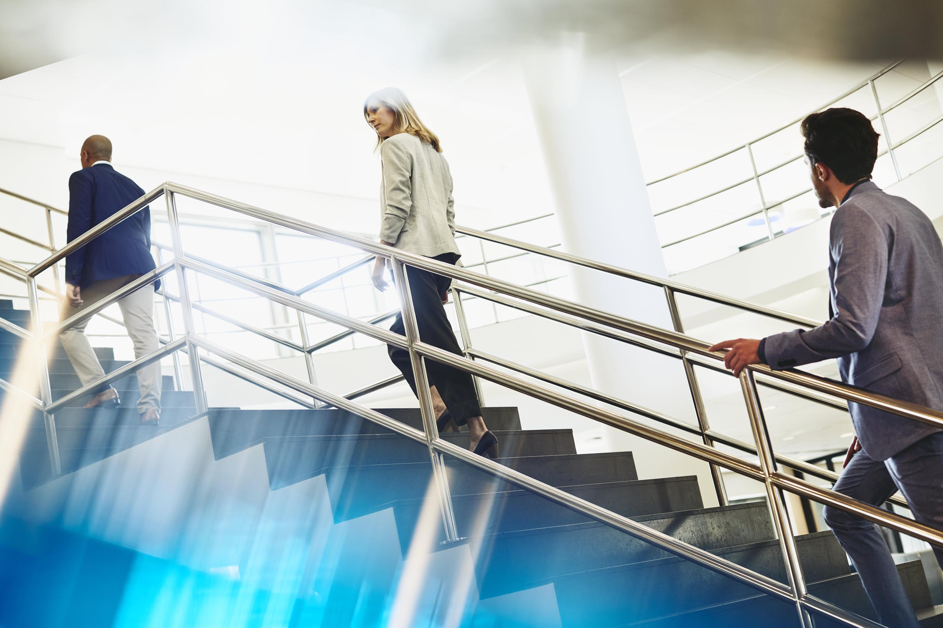 people walking up the stairs