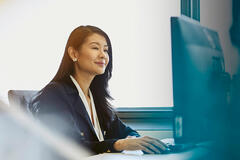 A woman working on a computer