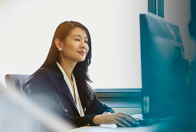 A woman working on a computer