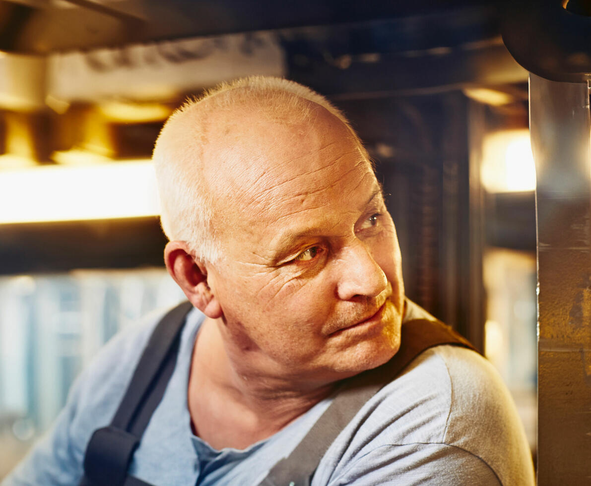A man in overalls