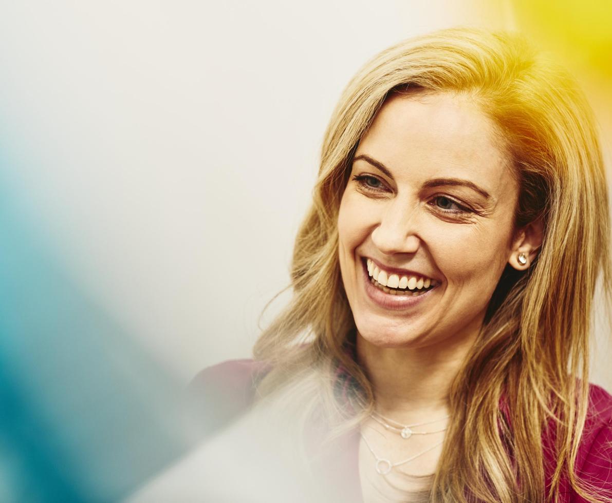 Smiling woman in an office Smiling woman in an office