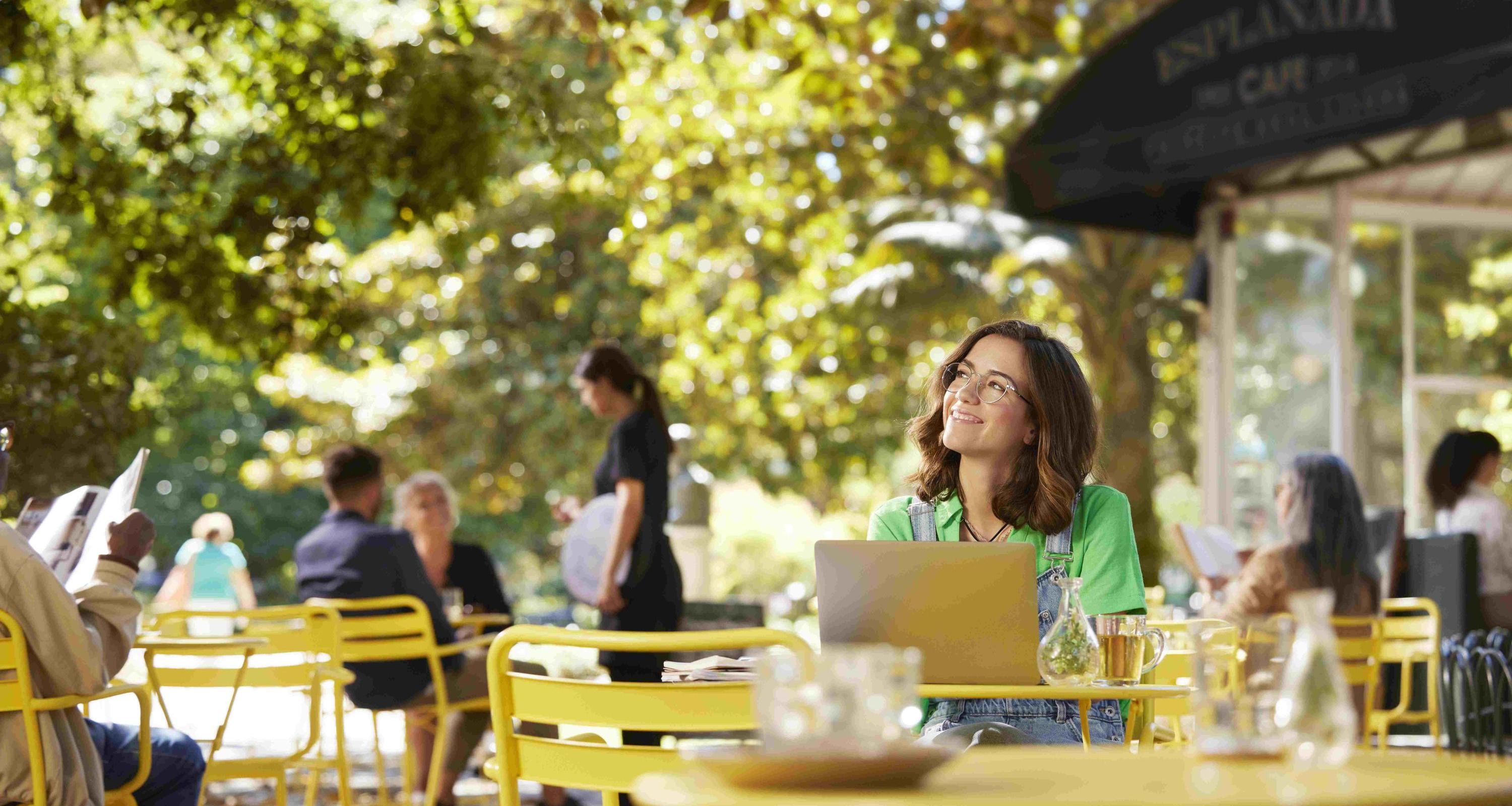 girl sitting at a cafe