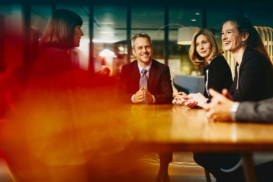 group of people in a board room