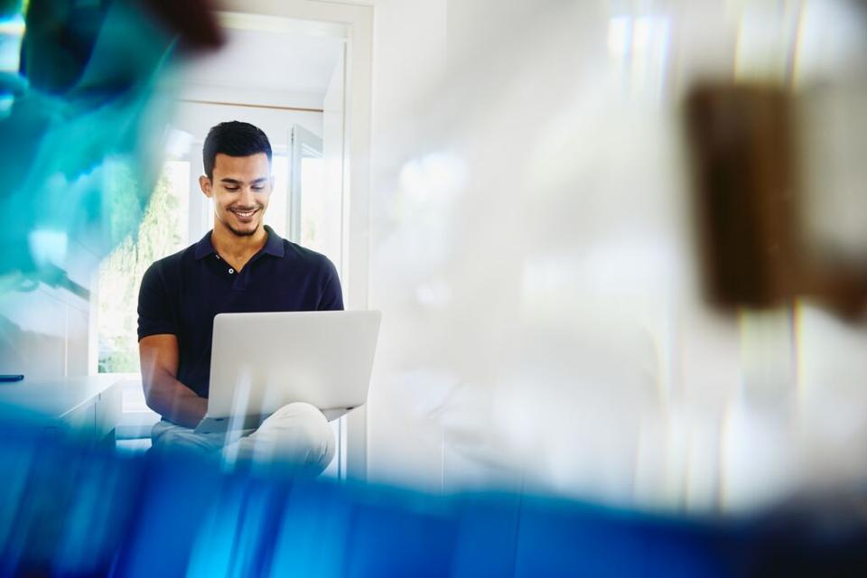 a men behind a computer